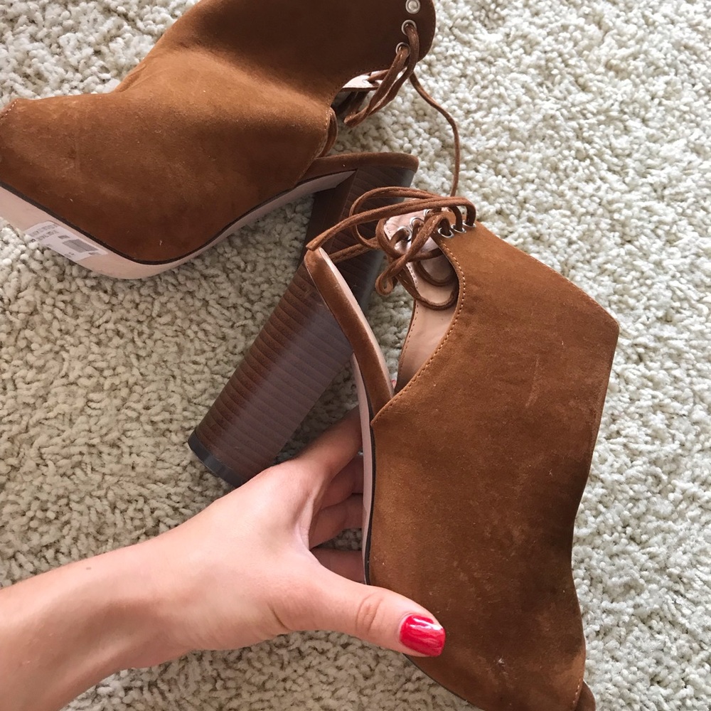 Women’s brown heels- never worn.
